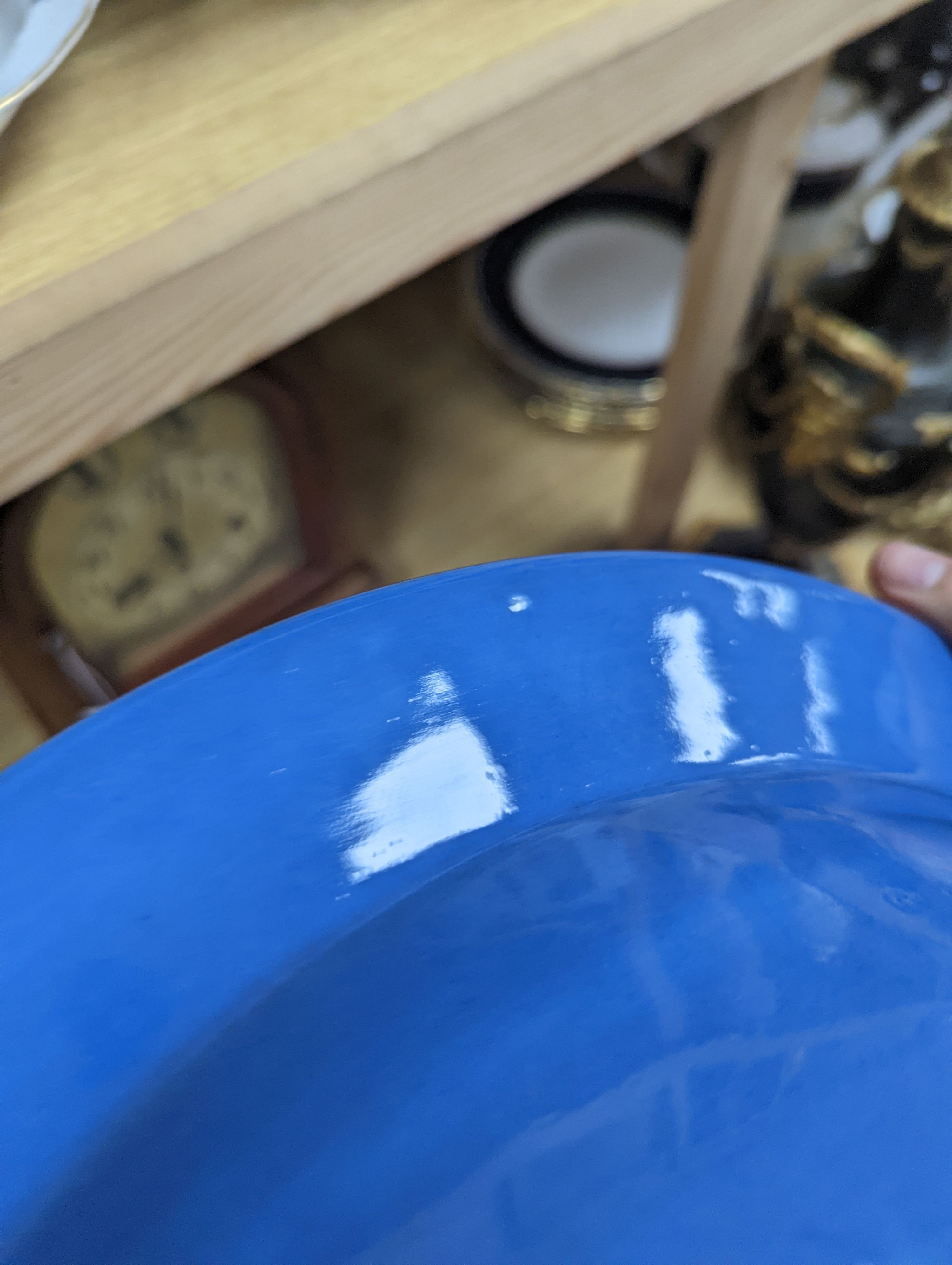 A Chinese export slip decorated blue ground basin, c.1830 - 40cm diameter